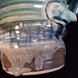 Stoneware tall jug, glaze details