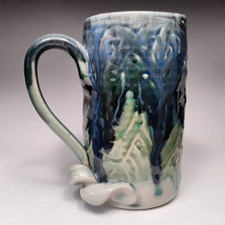 Tall stoneware beer mug, left view
