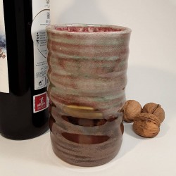 Stoneware tumbler, tall glass, left view