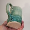 Tall stoneware beer mug, down side view