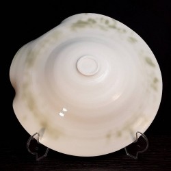 Plato mediano de porcelana translúcida, vista inferior